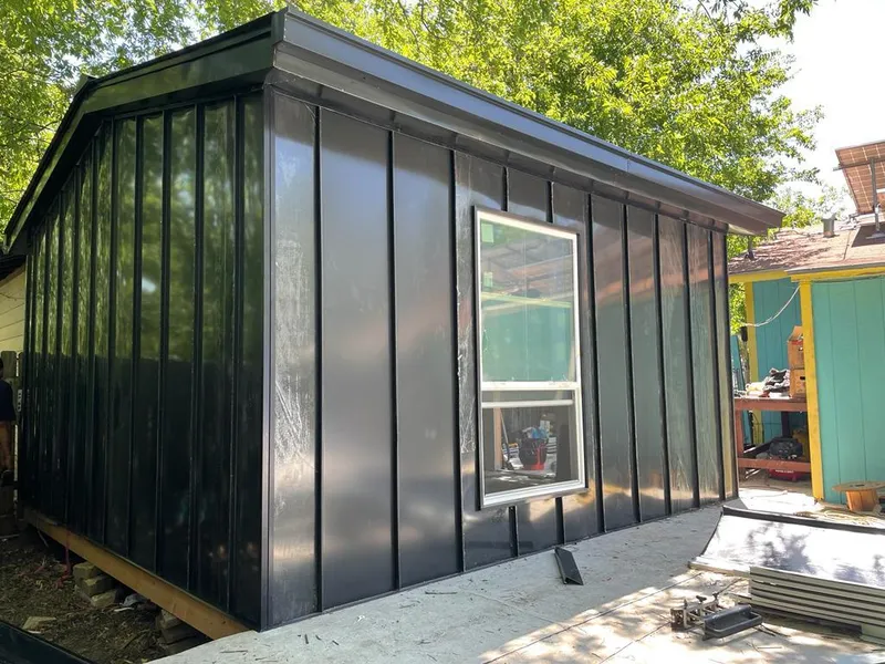 Black standing seam metal wall panels for Metal Roof Installation in Hazelwood