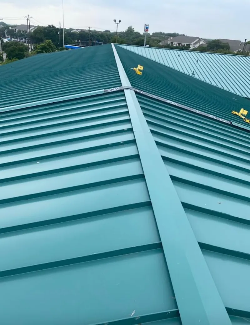 Green commercial metal roof ridge and valley for Metal Roof Repair in Hazelwood